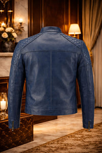 Back view of a sleek blue leather jacket featuring quilted detailing, perfect for stylish evening wear.